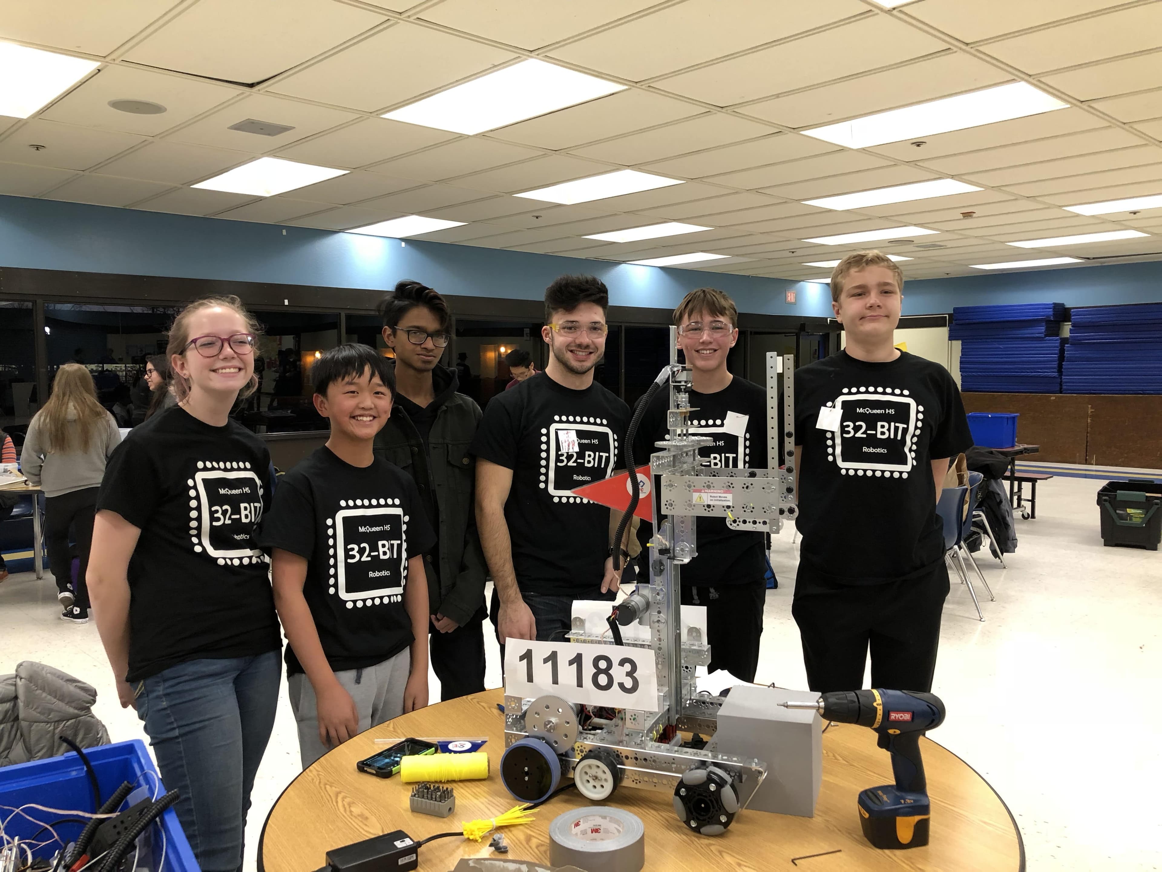 My team and I at a First Tech Challenge (FTC) competition in front of our robot My team and I at a First Tech Challenge (FTC) competition in front of our robot